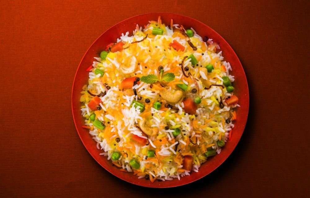 A mixed vegetarian and non-vegetarian Indian spread at Musafir Kitchen & Bar, Brampton